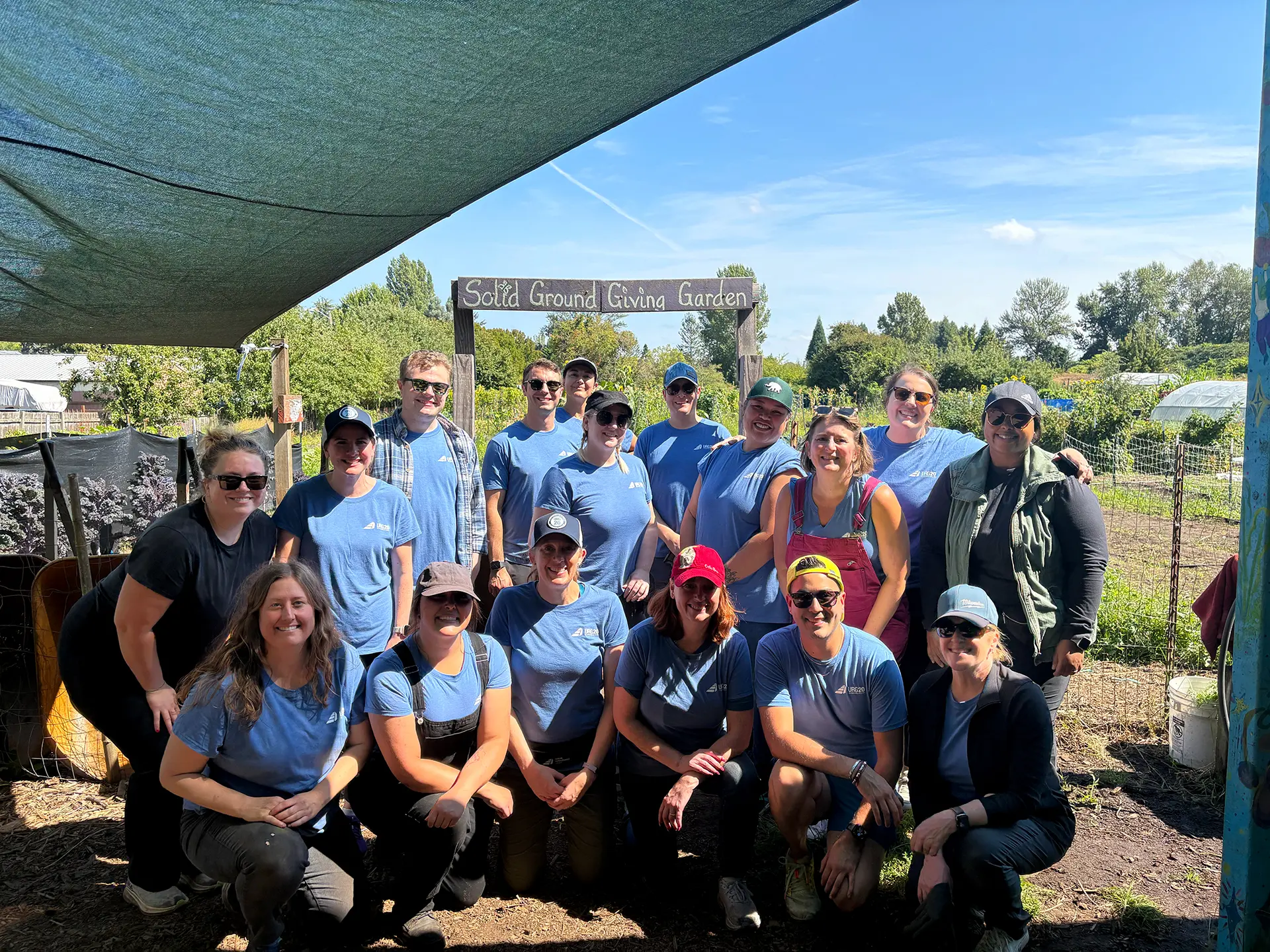 A group of URG employees at Marra Farm in South Seattle after a volunteer event in support of Solid Ground, a nonprofit organization.